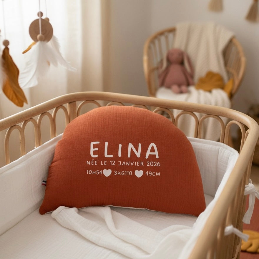Coussin naissance arc en ciel